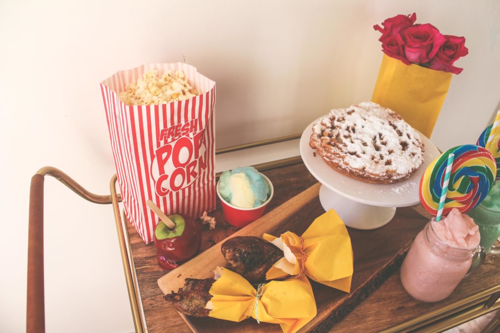 funnel cake, turkey legs, candy apple, carnival date night, date night ideas, cotton candy, carnival lollipop, cotton candy pina colada,